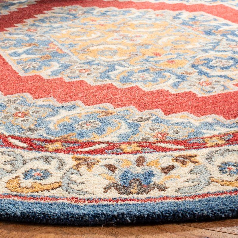 Antiquity AT505 Hand Tufted Area Rug - Blue/Red - 6' Round - Safavieh.