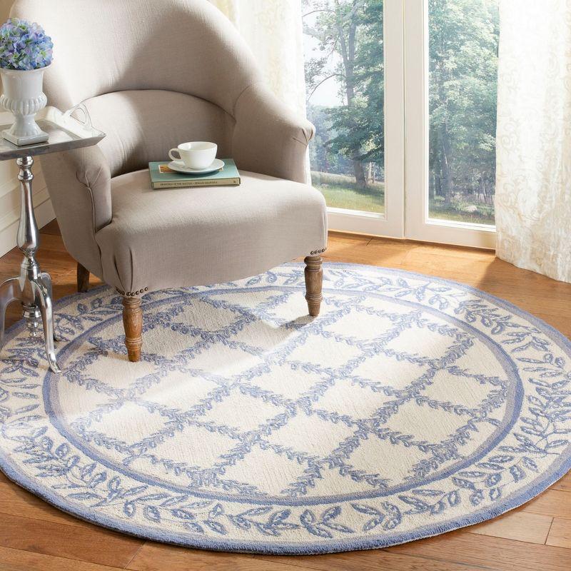 Ivory and Light Blue Round Tufted Wool Area Rug