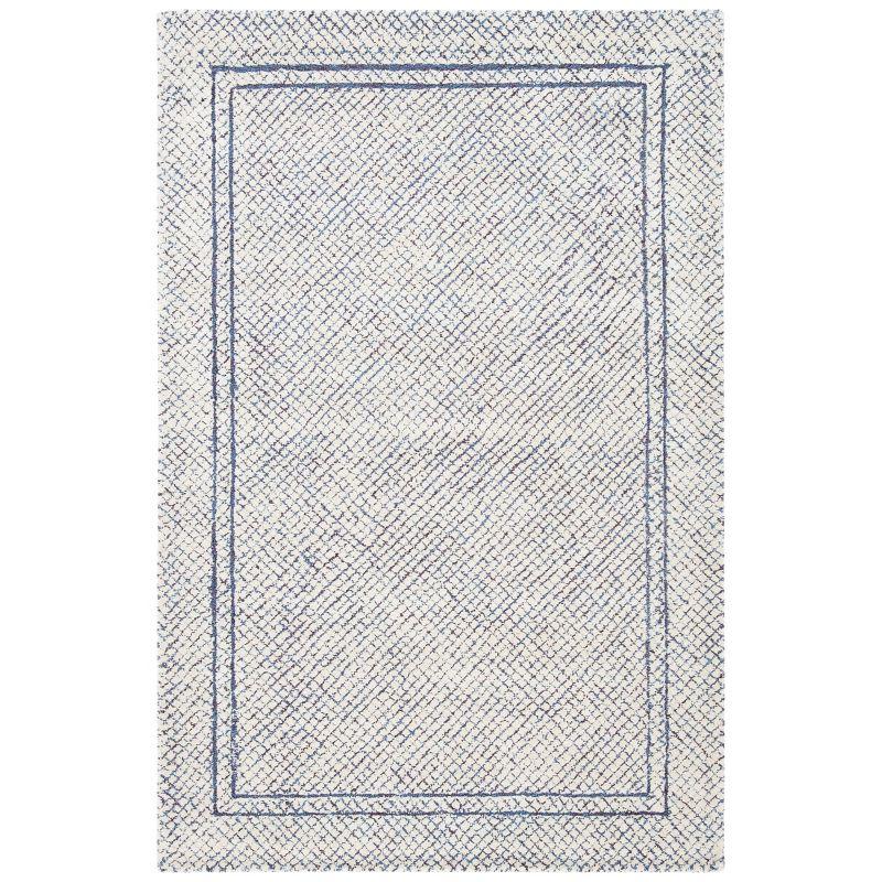 Ivory and Navy Abstract Hand Tufted Wool Area Rug