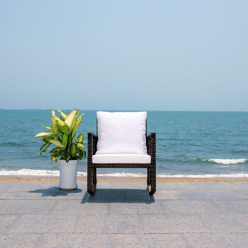 Breezy Black PE Rattan Rocking Chair with Plush White Cushions