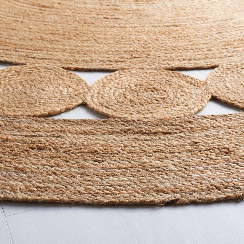 Hand-Knotted Artisan Jute 9' Round Rug in Natural Tone