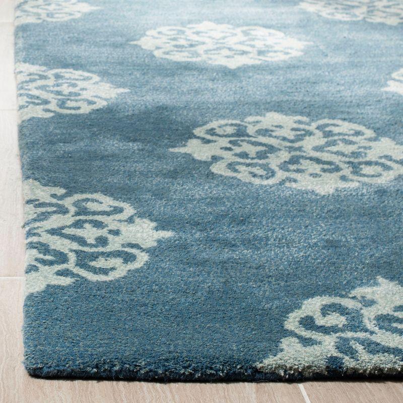 Soho SOH424 Hand Tufted Area Rug  - Safavieh