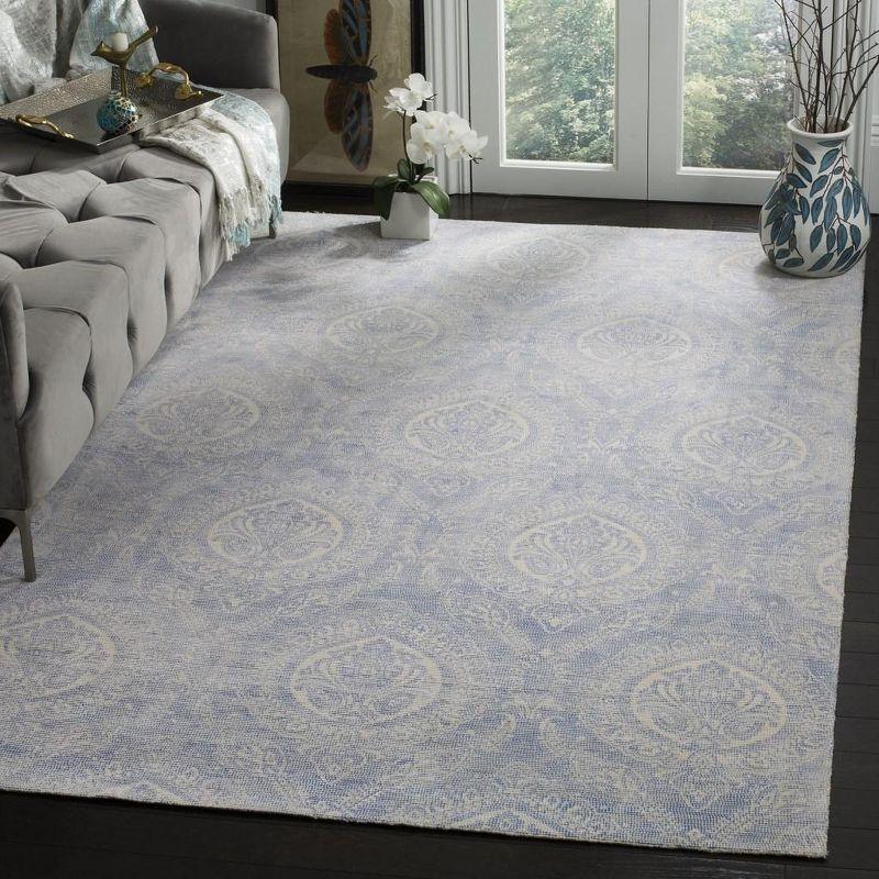 Marbella Blue and Ivory Hand Loomed Wool Area Rug