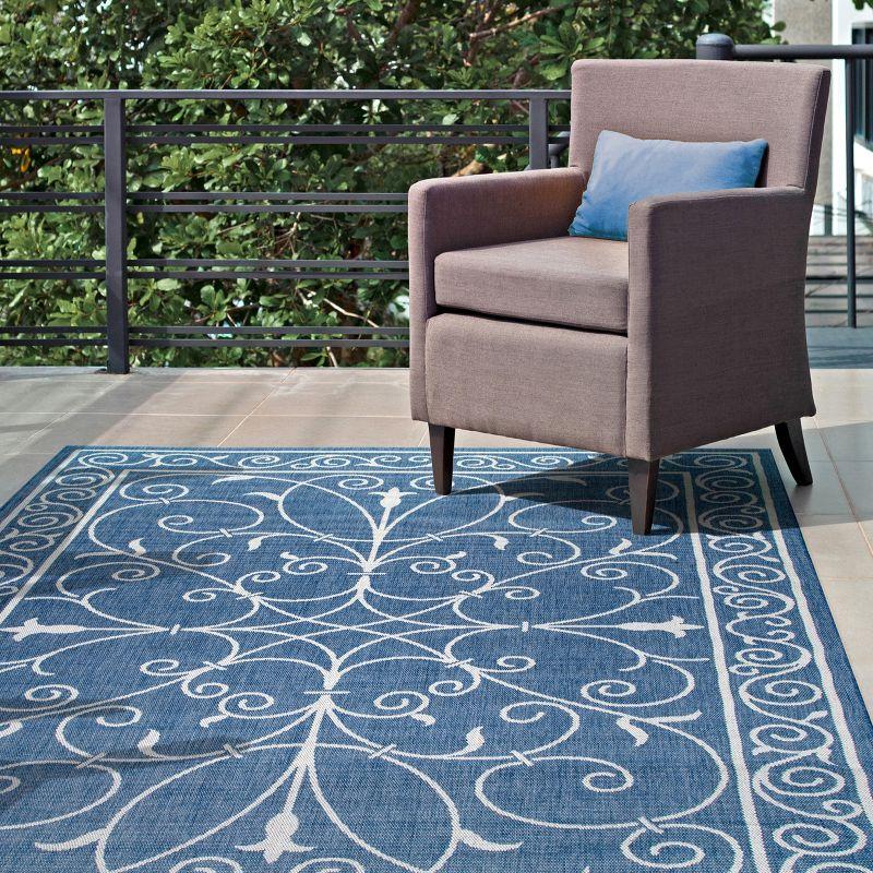 Charming Blue 5' x 7' Rectangular Synthetic Indoor/Outdoor Rug