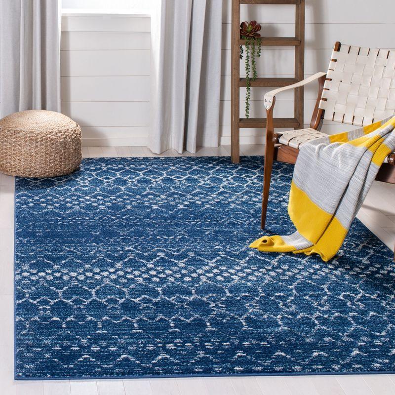Hand-Knotted Boho-Chic Blue/Ivory Synthetic Area Rug - 5'3" x 7'6"