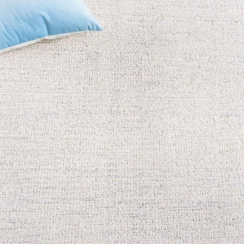 Ebony EBN353 Hand Tufted Area Rug - Light Grey/Ivory - 5'x8' - Safavieh.