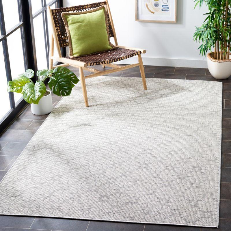 Grey and Ivory Square Tufted Synthetic Area Rug