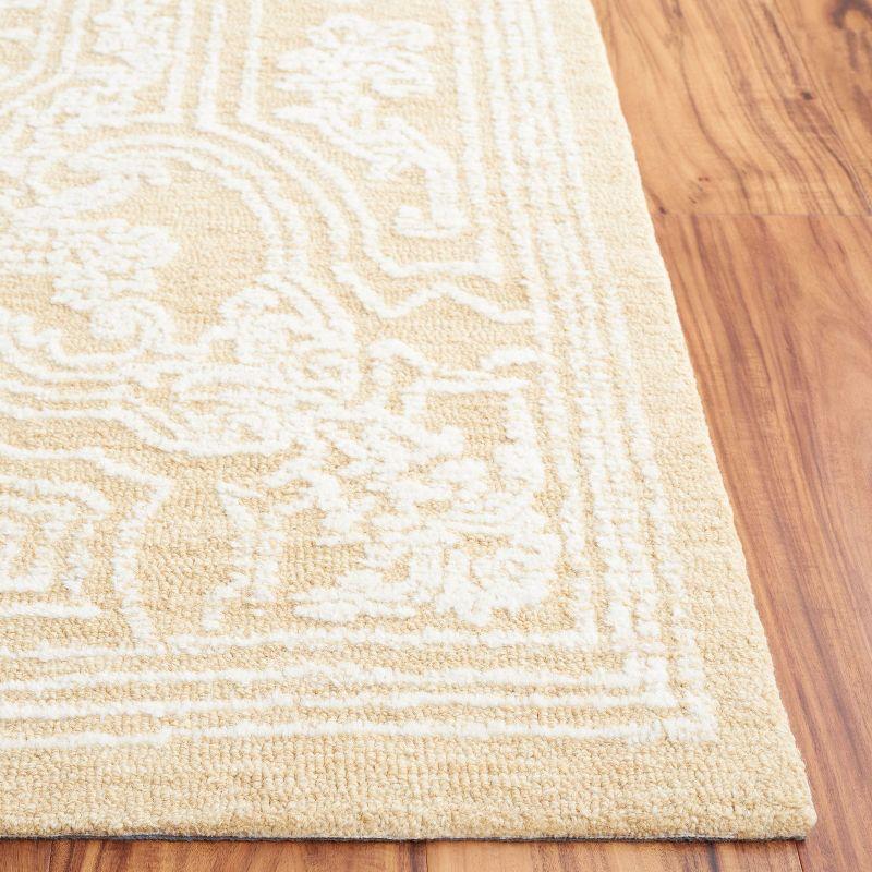 Ebony EBN310 Hand Tufted Indoor Area Rug - Ivory/Gold - 5'x8' - Safavieh