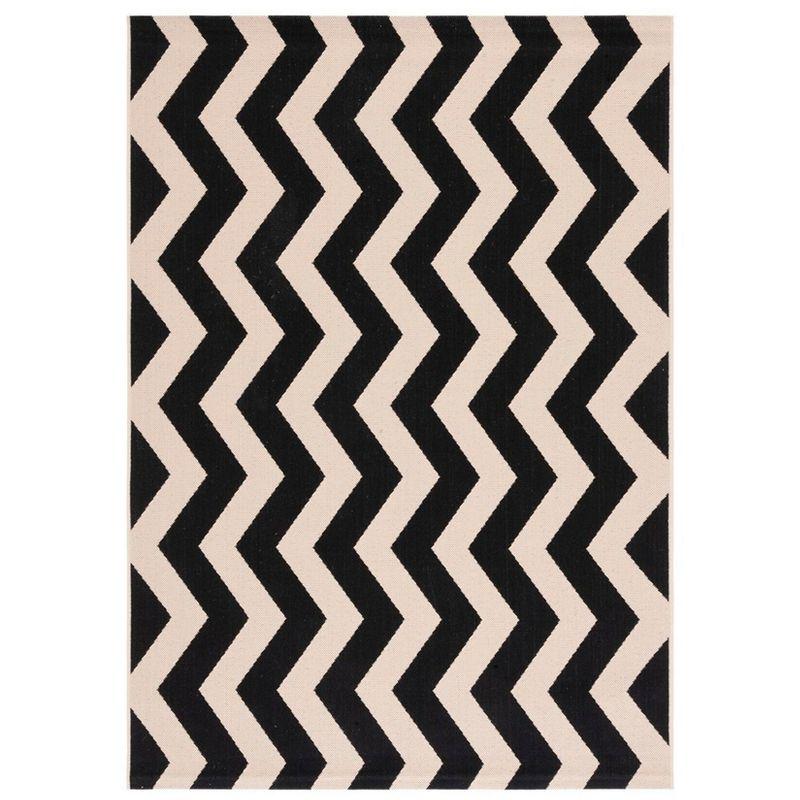 Elegant Black and Beige Rectangular Synthetic Area Rug - 47"x5'7"