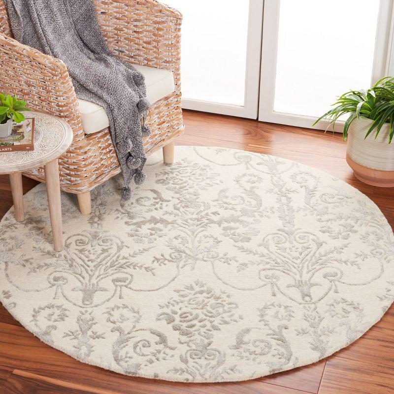 Hand-tufted Elegance Round Gray Wool & Viscose Rug - 59"