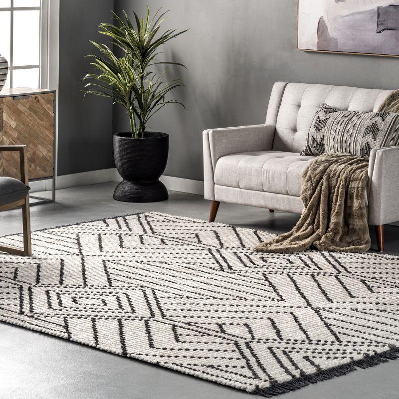 Luxurious Beige Synthetic 6'7" x 9' Shag Area Rug with Modern Diamond Fringe