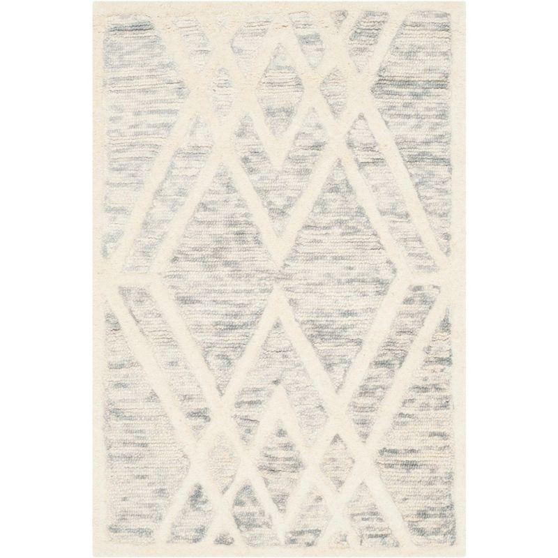 Cambridge CAM729 Hand Tufted Area Rug  - Safavieh