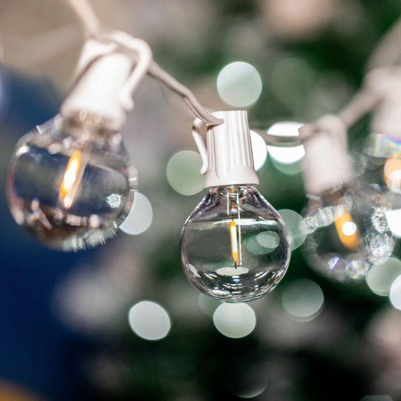 Novelty Lights 50 Feet Warm White LED G50 Globe Plastic Shatterproof Outdoor Patio String Lights, White Wire