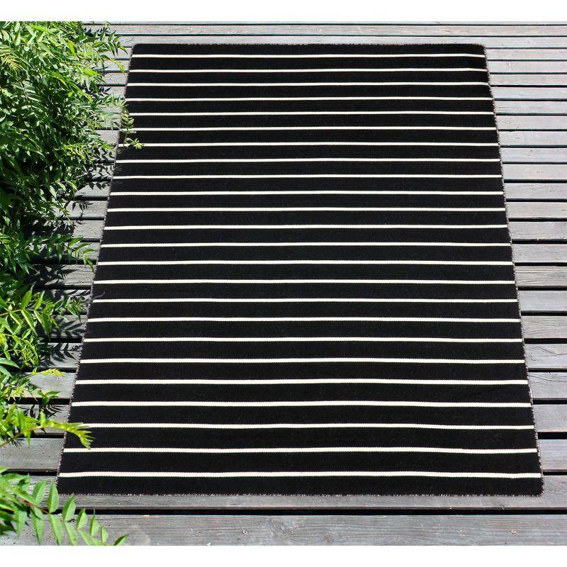 Sleek Serenity Black Stripe 5' x 7' Reversible Synthetic Rug