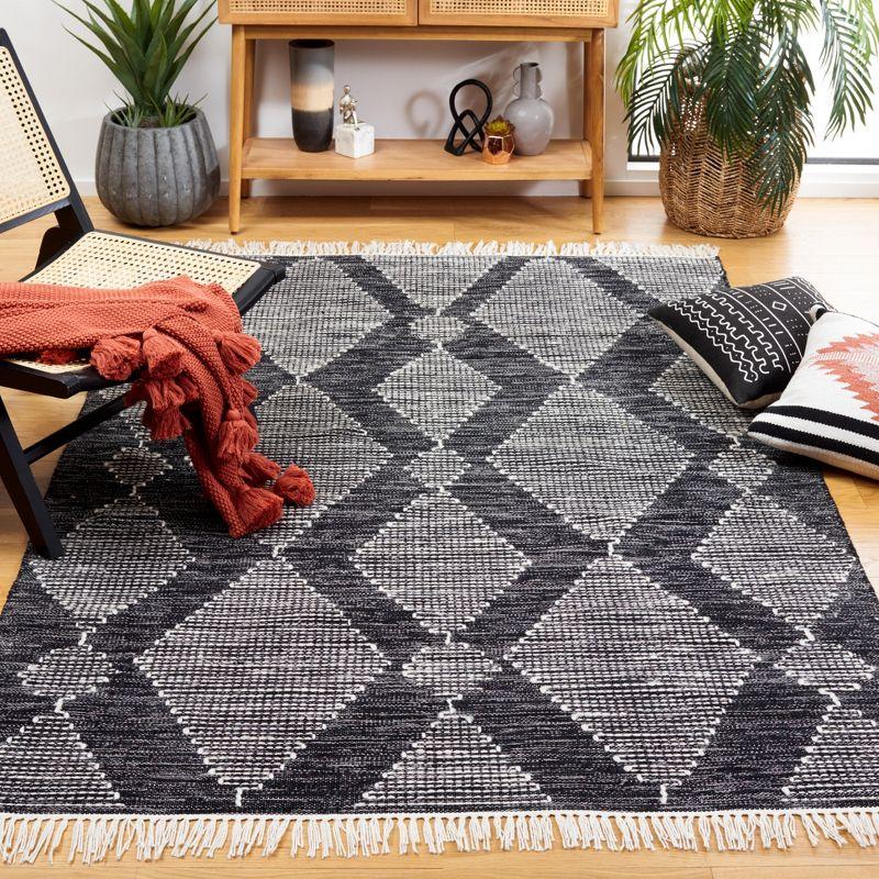 Bohemian Nomad Black & Ivory 4' x 6' Synthetic Area Rug