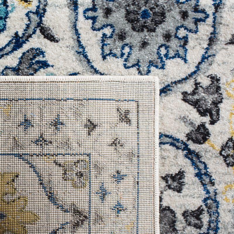 Evoke EVK210 Power Loomed Area Rug - Ivory/Blue - 6'7"x9' - Safavieh.