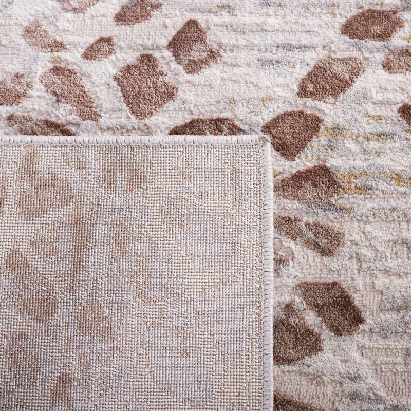 Ivory and Beige Hand-Knotted Synthetic Area Rug