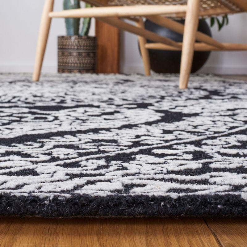 Black and Ivory Hand-Tufted Wool 4' x 6' Area Rug