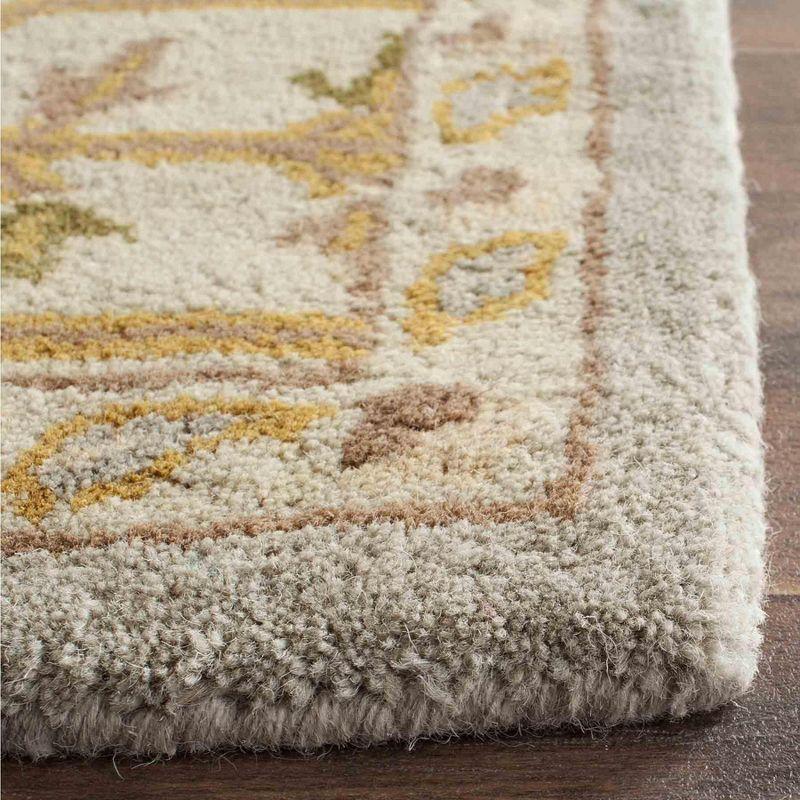Classic CL933 Hand Tufted Area Rug - Light Blue/Ivory - 5'x8' - Safavieh.