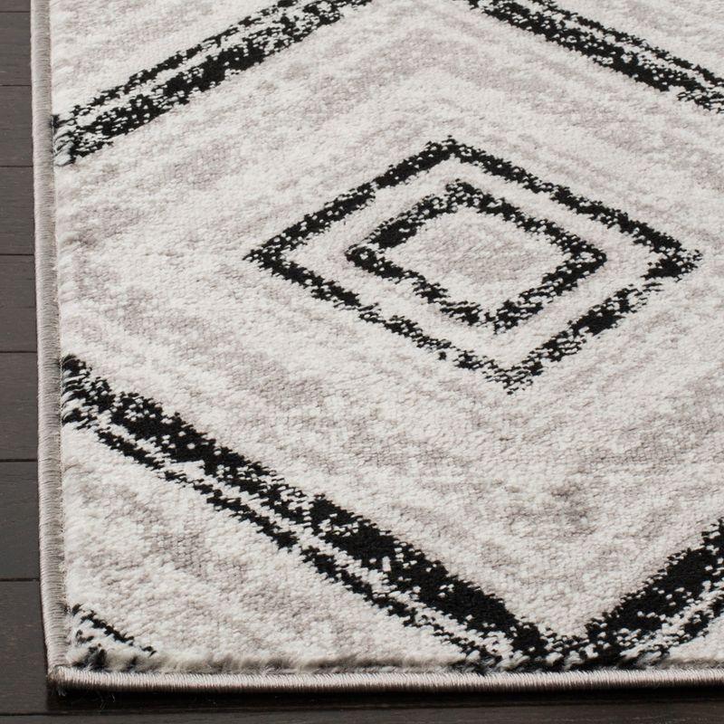 Skyler Geometric Silver Synthetic 9' x 12' Area Rug