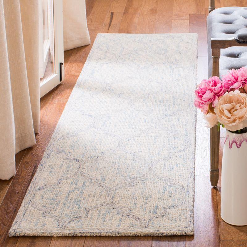 Ivory and Light Blue Handmade Wool Abstract Area Rug