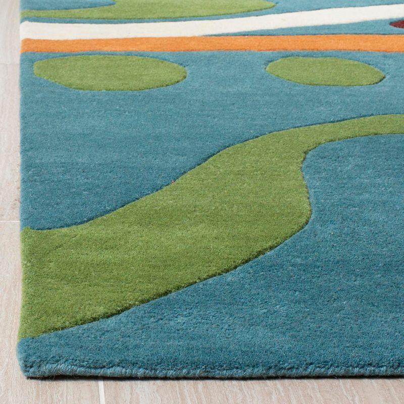 Teal and Multicolor Handmade Wool and Viscose Area Rug