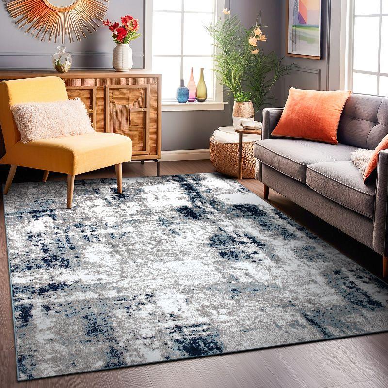 Reversible Blue Abstract Synthetic 5' x 7' Easy-Care Area Rug