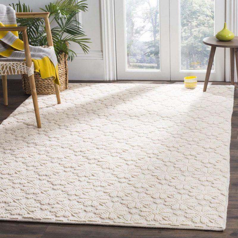 Ivory Hand-Woven Wool and Synthetic 4' x 6' Area Rug