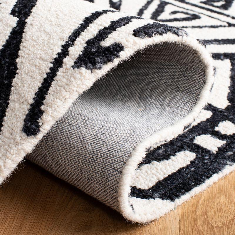 Metro MET404 Hand Tufted Area Rug - Black/Ivory - 8'x10' - Safavieh.