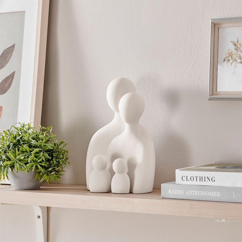 Wrought Studio™ Hans Cream Abstract Nesting Three Piece Family Of 4 Decorative Accent Matte Ceramic Sculpture Figure Set