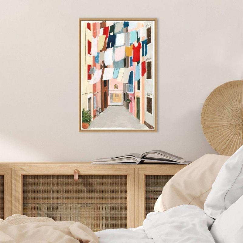 Urban Cityscape Laundry Day Canvas Print with Maple Frame