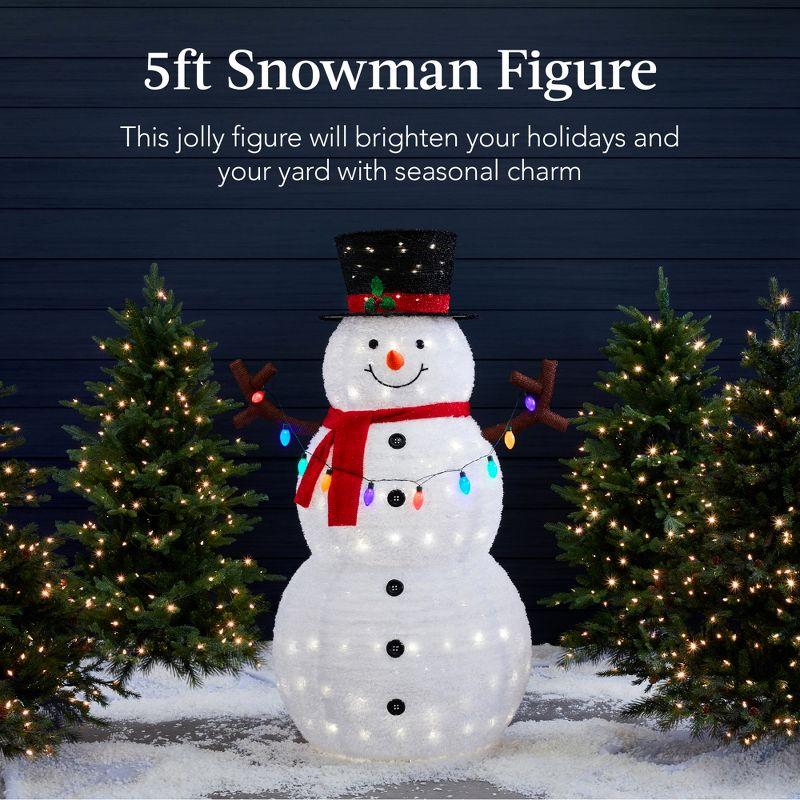 The Holiday Aisle® The Holiday Aisle® 5Ft Lighted Pop-Up Snowman, Outdoor Christmas Holiday Decoration W/ 200 LED Lights, Hat, Scarf