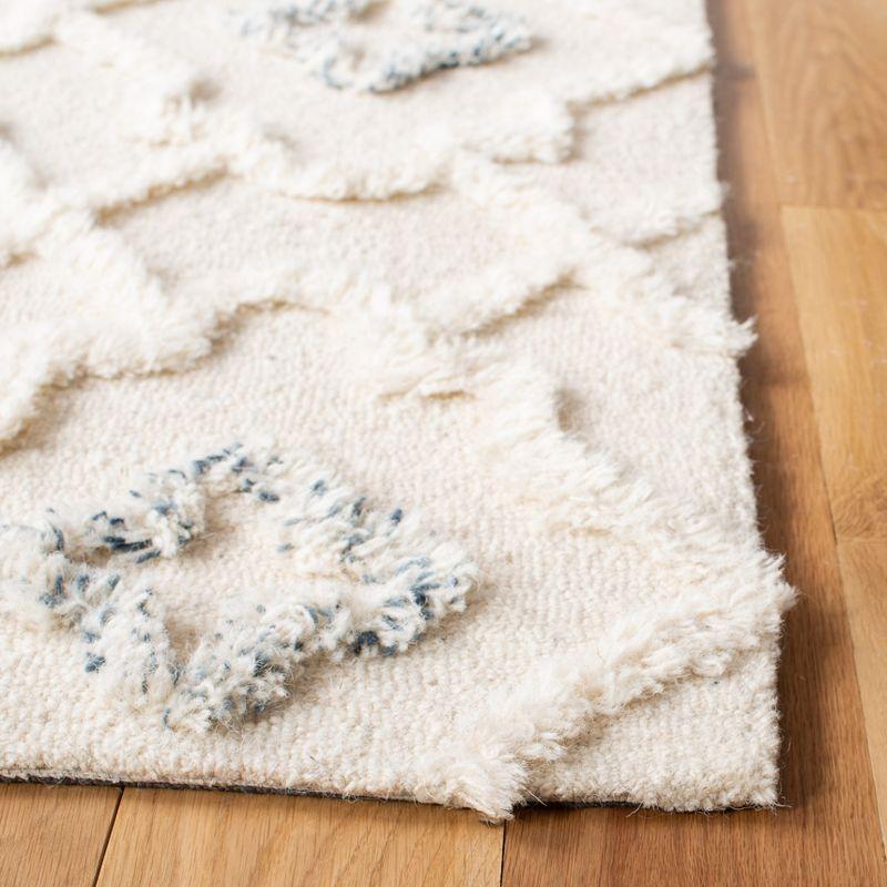 Ivory Hand-Tufted Wool Shag 8' x 10' Area Rug