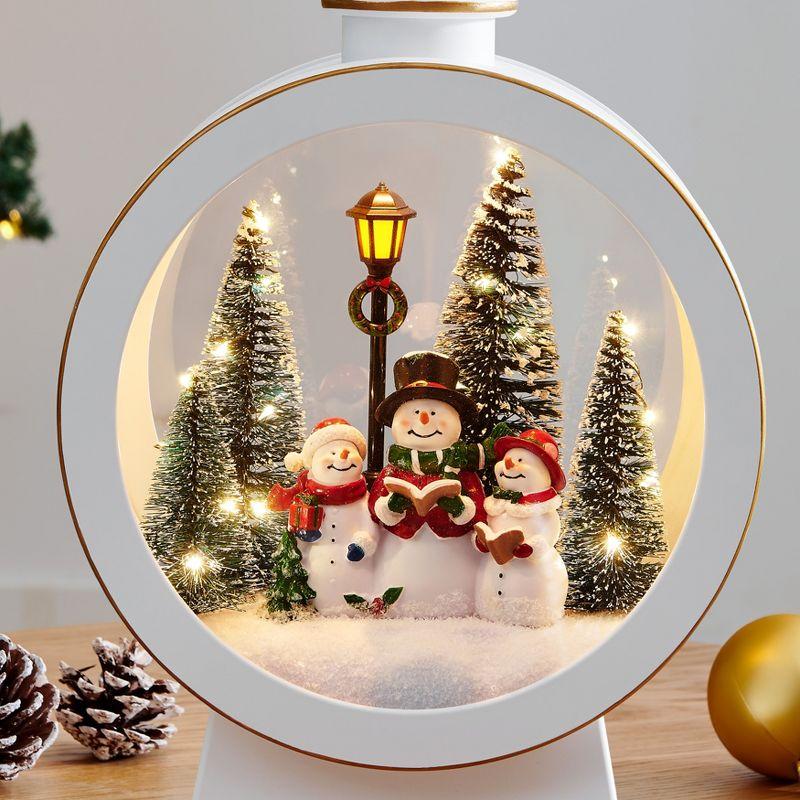 Danya B. Tabletop White Christmas Holiday Winter Snowman Scene Diorama Lighted Lantern Decoration - Oval