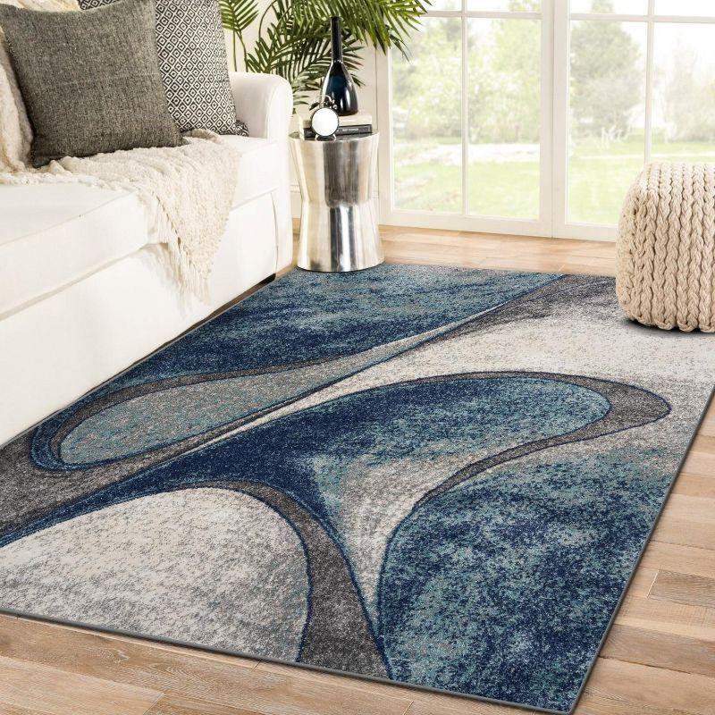 Abstract Swirls 8' x 10' Blue Synthetic Area Rug