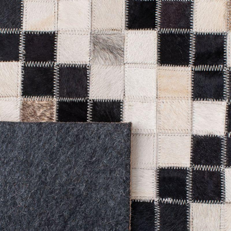 Geometric Black and Ivory Hand-Stitched Cowhide Area Rug 4' x 6'