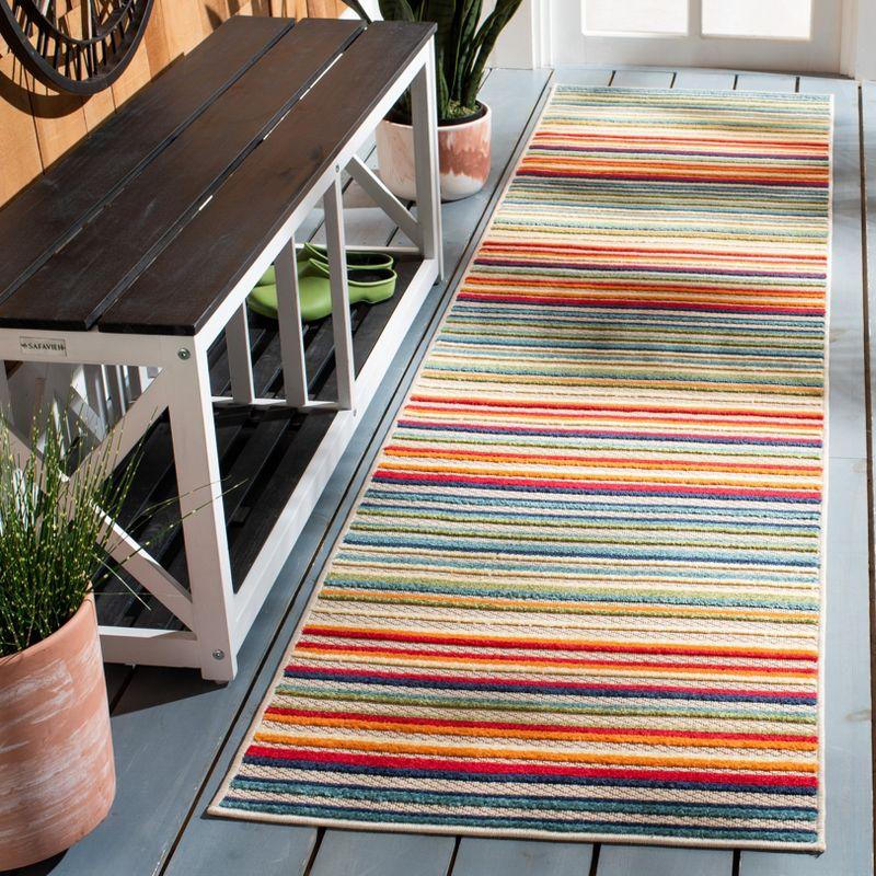 Ivory and Green Geometric Synthetic Runner Rug