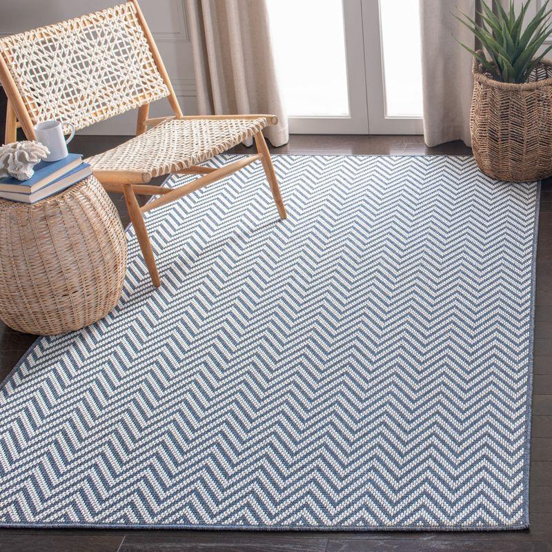Bermuda BMU812 Power Loomed Indoor/Outdoor Area Rug - Blue/Creme - 6'7"x9'2" - Safavieh.