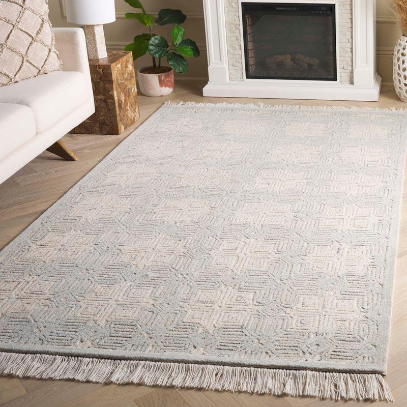 Ikat IKT805 Hand Tufted Area Rug - Ivory/Light Blue - 3'x5' - Safavieh.