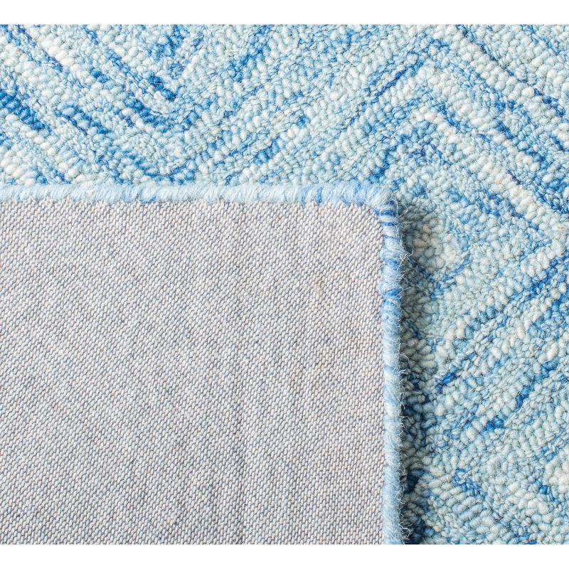 Ikat IKT704 Hand Tufted Area Rug - Blue - 6'x9' - Safavieh.