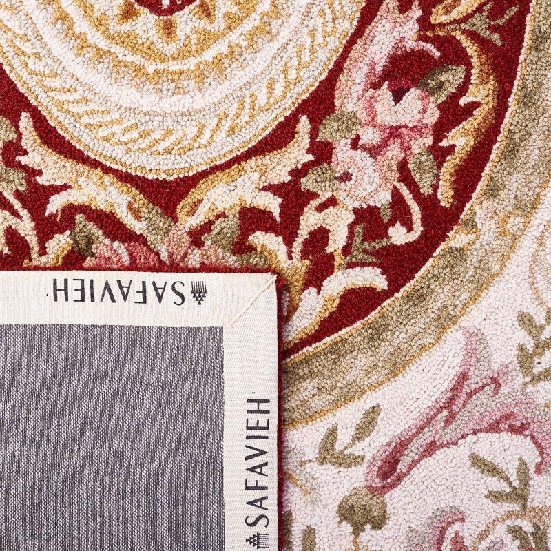 Elegant Ivory and Burgundy Hand-Knotted Wool Runner Rug