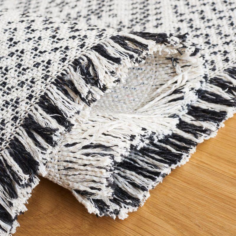 Augustine AGT507 Machine Made Indoor Area Rug - Ivory/Black - 5'x7'-7" - Safavieh