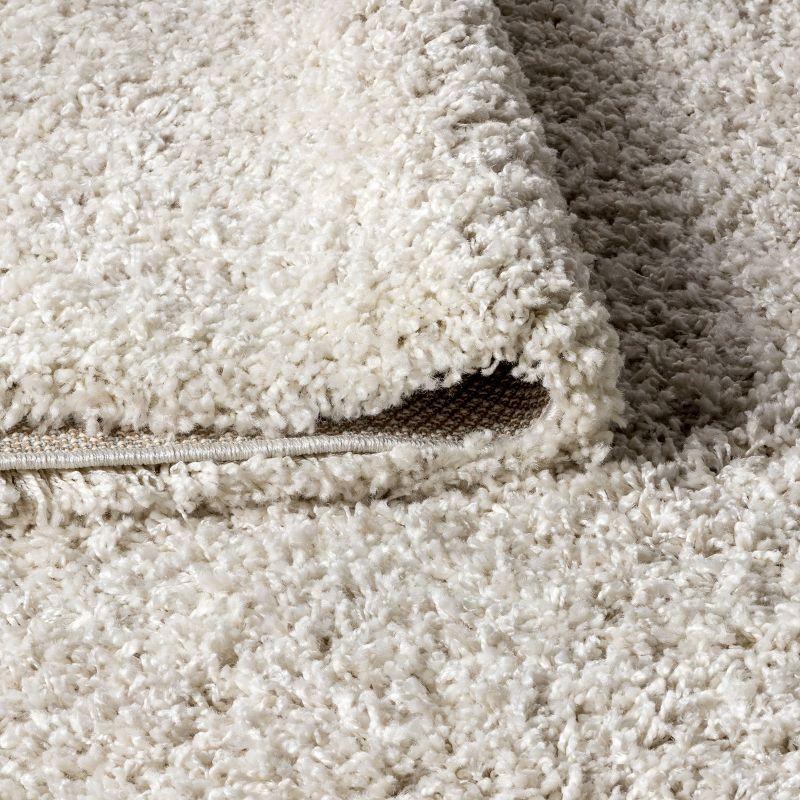 Mercer Shag Plush Tassel Moroccan Diamond Area Rug - JONATHAN Y