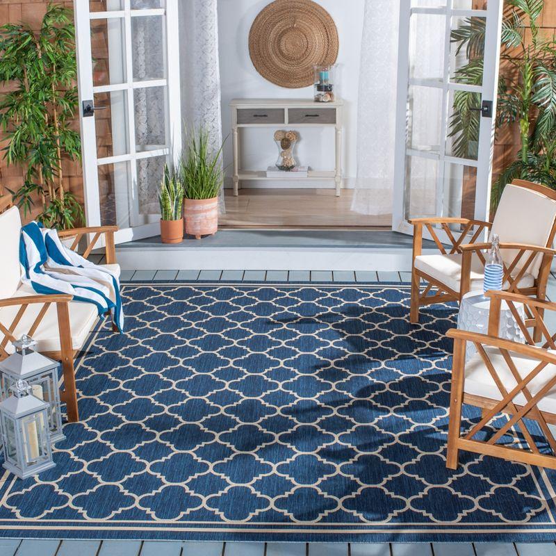 Courtyard 6'7" x 9'6" Blue Synthetic Flat Woven Round Rug