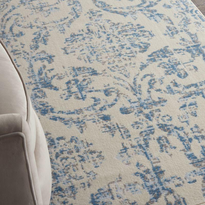 Ivory and Blue Distressed Damask 3' x 5' Area Rug