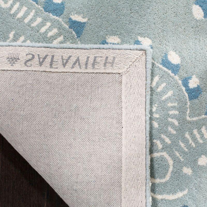 Wyndham WYD372 Hand Tufted Indoor Area Rug - Blue/Ivory - 4'x6' - Safavieh.
