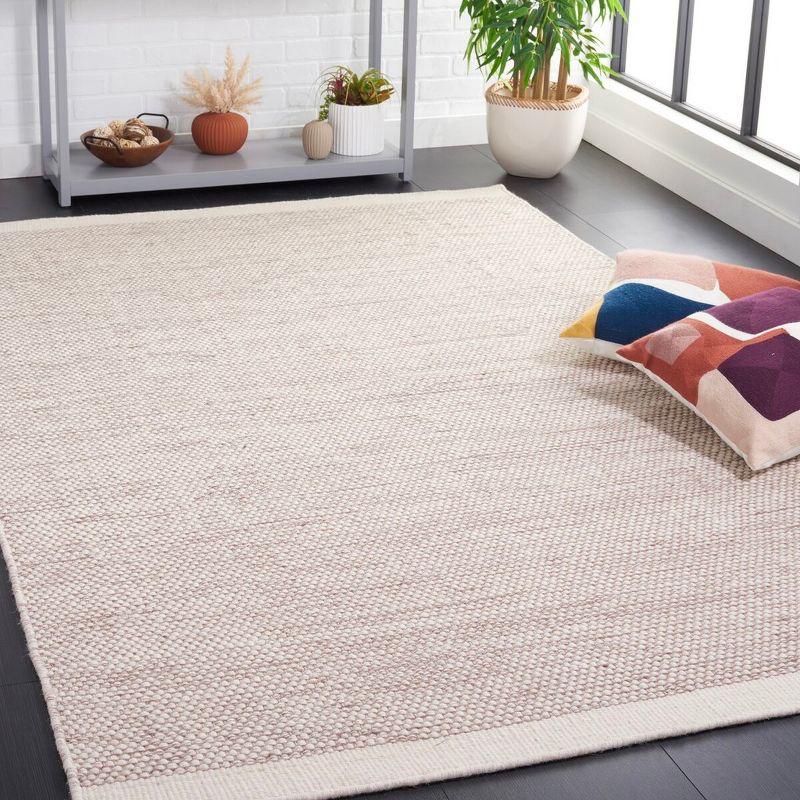 Ivory and Brown Braided Hand-Tufted Wool 6' x 9' Rug