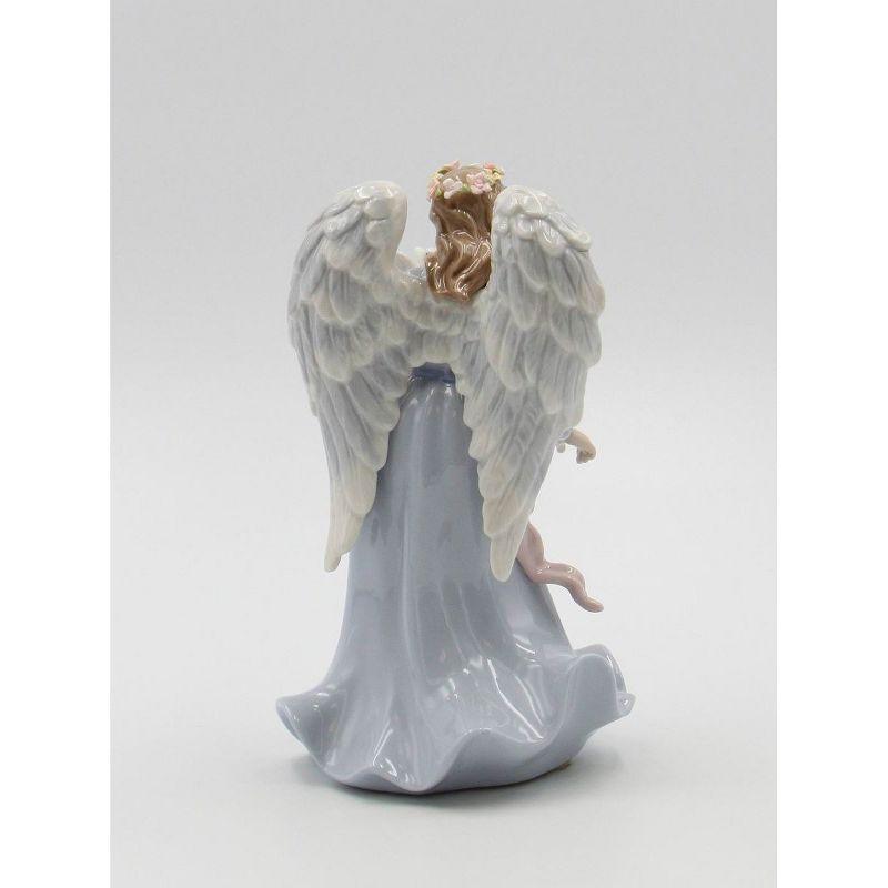 Kevins Gift Shoppe Ceramic Angel Holding Peace Dove Music Box