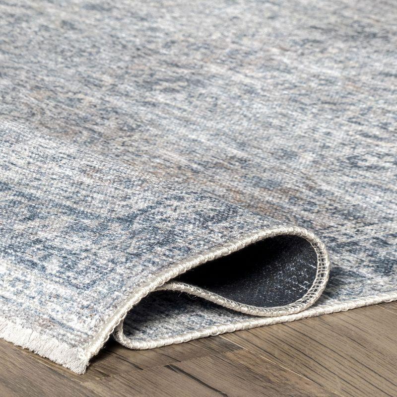 Light Blue 5' x 7' Washable Synthetic Area Rug