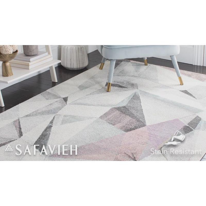 8' x 10' Gray and Orange Abstract Synthetic Area Rug